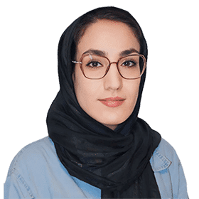 a woman wearing glasses and a scarf
